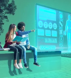 Boy and Girl sitting on a bench looking at a computer screen